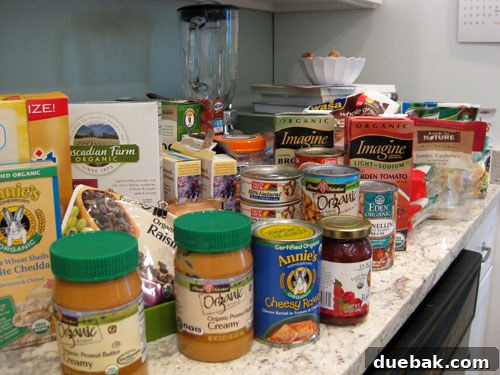 All contents of kitchen cabinets spread out on the counter during cleanout