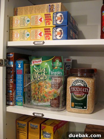 Organized 'Sides' section in kitchen cabinet with a clear caddy
