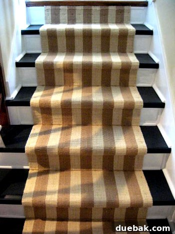 Stunning black and white painted staircase with natural jute runner post DIY
