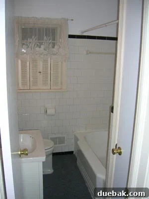 Elevate Your Small Home The Power of Cohesive Flooring 3 Yellowed vinyl tile in an old half-bath