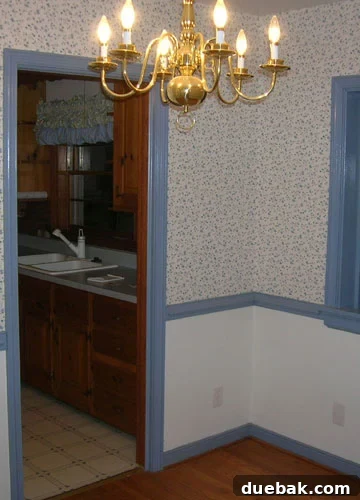 Elevate Your Small Home The Power of Cohesive Flooring 4 Dated blue linoleum in an old kitchen
