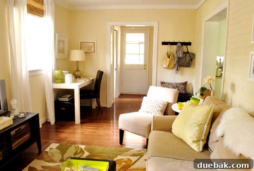 Elevate Your Small Home The Power of Cohesive Flooring 8 Dining area featuring cohesive dark hardwood floors