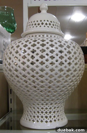 My HomeGoods Daydream 2 White cut-out urn, a sculptural decor piece for dining or console tables.