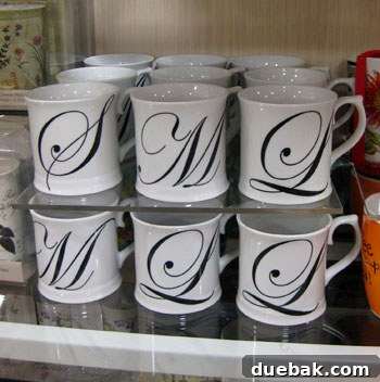My HomeGoods Daydream 12 Initial mugs, personalized and versatile for drinks or desk organization.