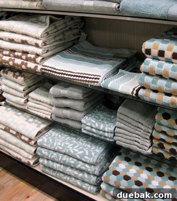 My HomeGoods Daydream 14 Vintage hex-tile inspired towels in blue, white, tan, and mocha.
