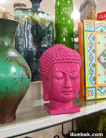 My HomeGoods Daydream 4 Hot pink Buddha statue, an eclectic accent for bookshelfs or tables.