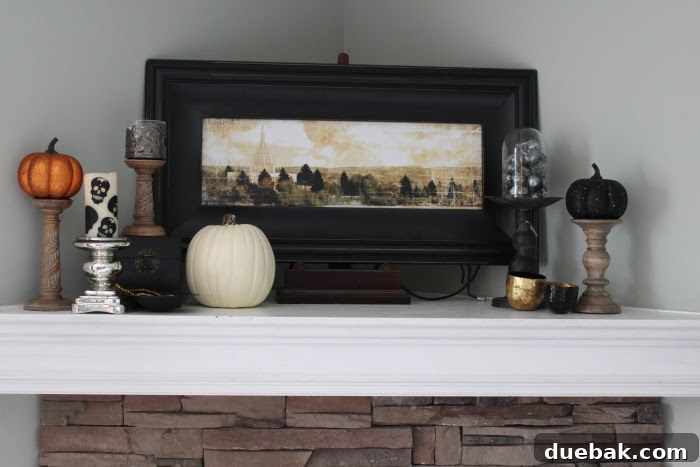 Stone corner fireplace with faux stone decorated for Halloween with candles, pumpkins and skulls.