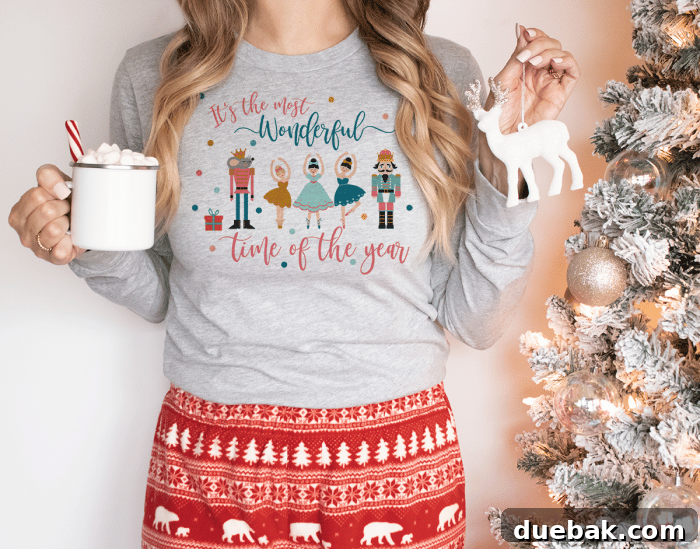 Nutcracker Wonderland Digital Graphics 4 A grey sweatshirt featuring the Nutcracker Christmas design with ballerinas, the Nutcracker, the Mouse King, and the text 'Its The Most Wonderful Time Of The Year'.