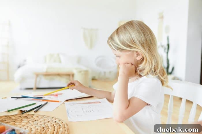 Print-Ready Thanksgiving Placemat Designs 2 Young child sitting at a table with paper and colorful pencils.