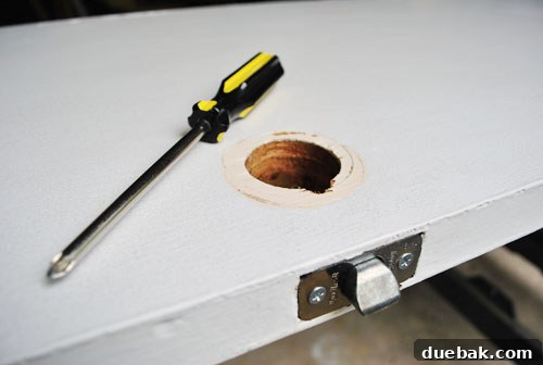 From Door to Desk: Craft Your Perfect DIY Workspace 8 Door with hinge holes filled and handle hole for cables