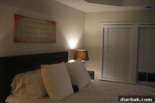 Creating a Faux Wallpaper Silver Wall Stencil 2 A plain room before a paint transformation, showing a simple wall without any patterns or significant decor, awaiting a creative touch.