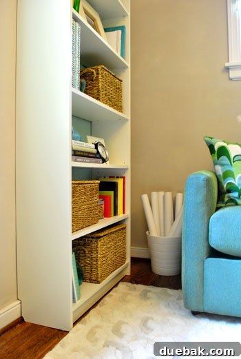Completed customized Billy Bookcase with a plant in the corner, showing full integration