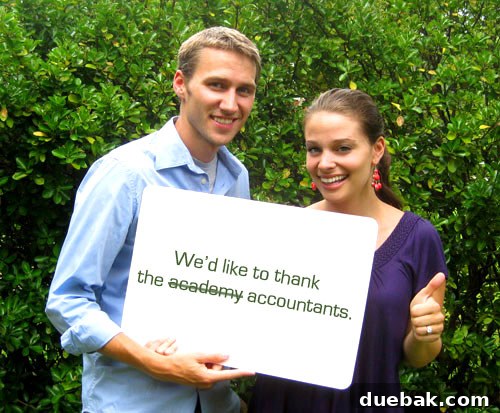Young House Love team reviewing business documentation