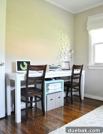 A view of the still-blank wall in the home office, awaiting artwork or decor decisions, indicating ongoing renovation.