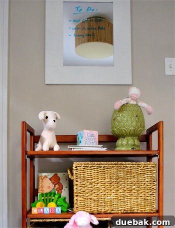 A mirror with a handwritten 'To Do' list, serving multiple functions in the room.