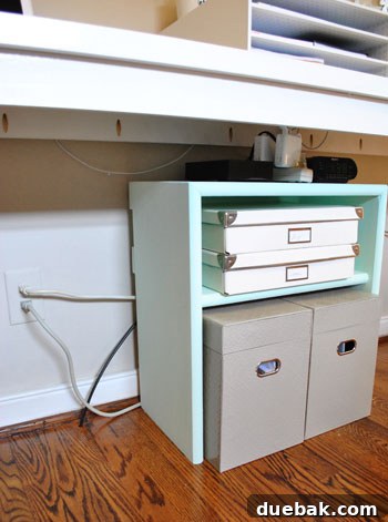 Untangle Your Tech Cables 3 Cluttered desk area with multiple power strips and cords
