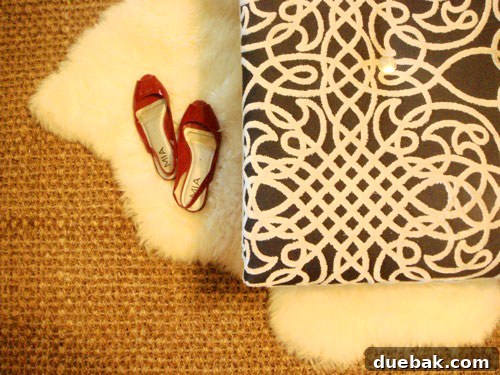 Handcraft Your Perfect Ottoman 18 Another perspective of the tufted ottoman in a home setting