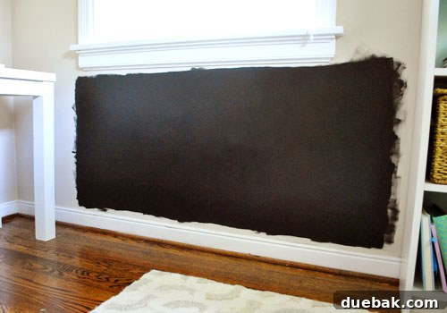 Applying magnetic primer to wall