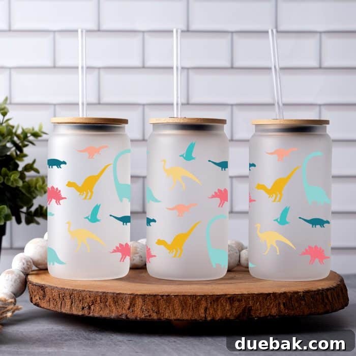 Jurassic Jar Jacket 2 Vibrant dinosaur designs on a glass can wrap, showcasing a mix of accuracy and cuteness.