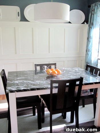Crafting a Steel and Marble Dining Table 5 Finished custom steel and marble dining table in a renovated dining room