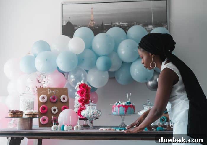 Pastel balloon arch for a baby celebration