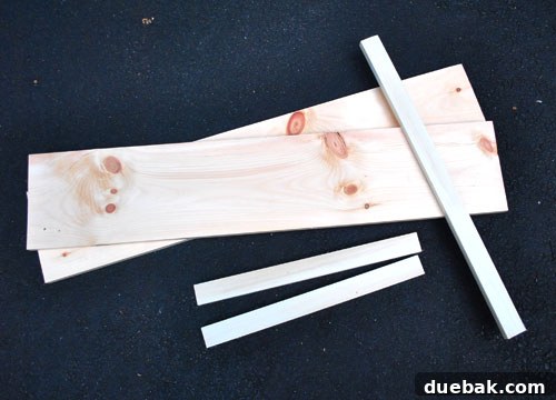 Clever Closet Shelf for Built-In Dog Crate 5 Lumber pieces for the DIY shelf laid out on a floor