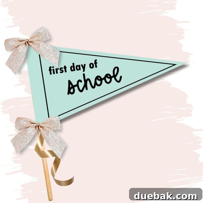 A printed first day of school pennant banner on a wooden stick, adorned with colorful ribbons and bows, showcasing a simple DIY prop.