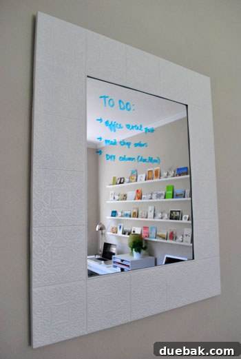 Full-length mirror with a dry erase to-do list or welcome note