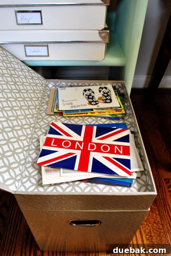 Organized file box with a compartment for postcards