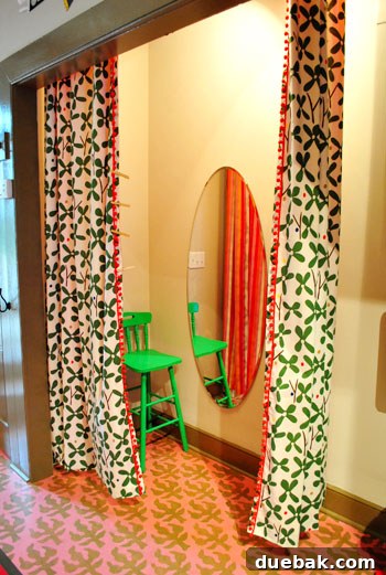 Kids play area with small chairs and TV