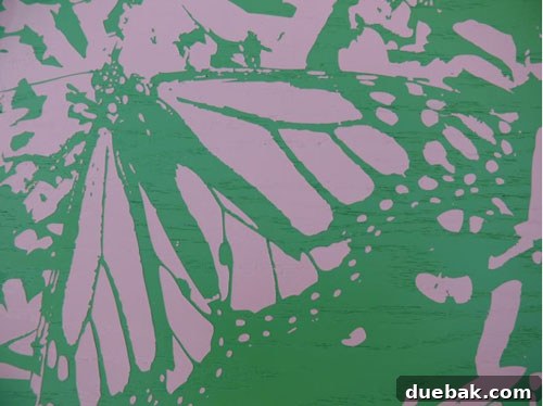 An arrangement of various custom abstract photo art pieces from Modern Bird Studios, demonstrating different color palettes and their versatility as home decor elements.