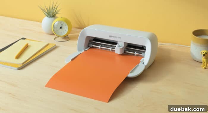 Mastering the Cricut Joy Xtra: Your Essential Guide 2 Cricut Joy Xtra machine cutting smart vinyl without a cutting mat, showcasing its compact yet capable design for seamless crafting.