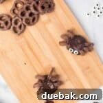 Simple Spooky Spider Treats for Halloween 12 Placing candy eyes on a chocolate spider treat