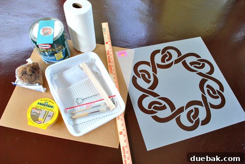 Transform Your Concrete Floor with Paint and Stencils 2 Stenciling supplies laid out on the floor