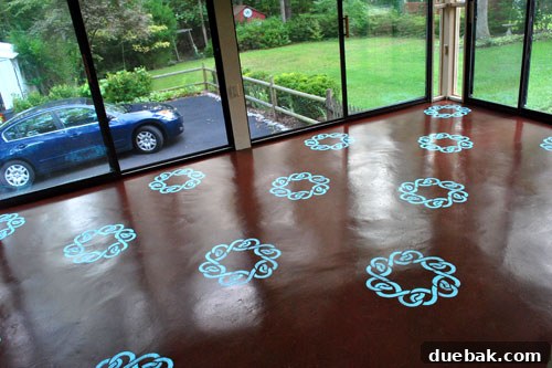 Transform Your Concrete Floor with Paint and Stencils 13 Another angle of the shiny, newly stenciled floor