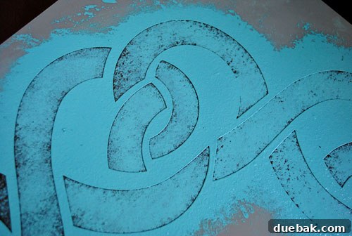 Transform Your Concrete Floor with Paint and Stencils 7 John grabbing a cardboard box for paint dabbing