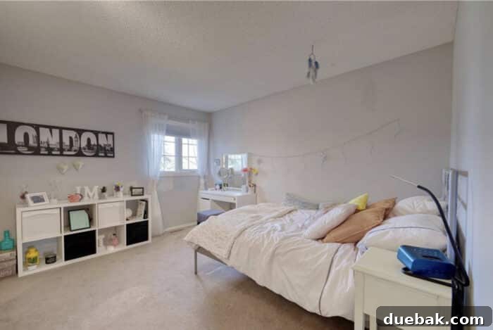 Shared Boys' Room Transformation: Feature Wall Impact 2 Before image of a plain, empty room with beige walls and a single window, awaiting a boys room makeover
