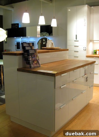 Elegant butcher block kitchen island with sleek design and charming details, perfect for modern kitchens