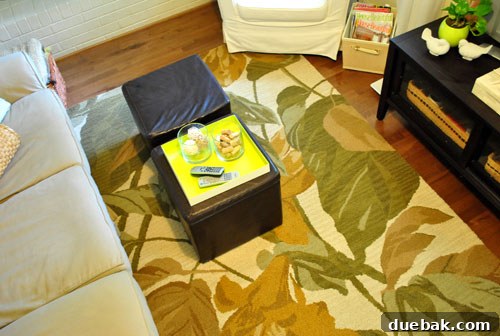 The bold and vibrantly patterned Clara rug in the den, a testament to embracing lively, expressive design.