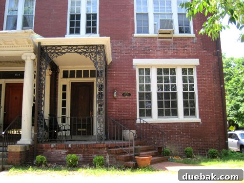 Stacie's historic Richmond Fan District home prior to renovation, showing aged facade and original architectural elements.