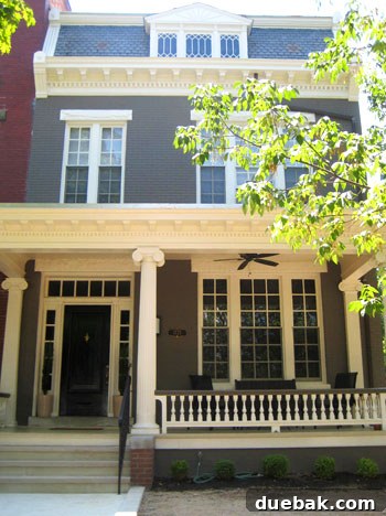 Stacie's stunningly renovated historic home exterior in Richmond's Fan District, featuring vibrant paint and perfectly restored details.