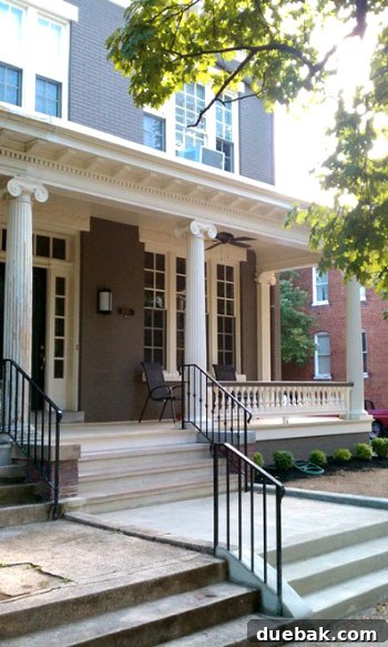 Close-up of the exquisitely renovated facade of Stacie's historic Richmond home, highlighting intricate restored features.