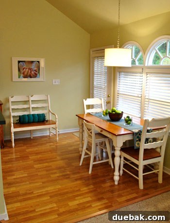Farah's Living Room Makeover: The Finished Look 12 White bench repurposed in the kitchen next to the dining table