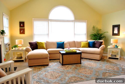 Farah's Living Room Makeover: The Finished Look 8 After image of Farah's family room, showcasing new paint and decor