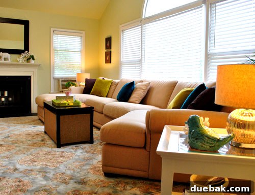 Farah's Living Room Makeover: The Finished Look 9 After image showing the family room with artichoke green walls and new rug