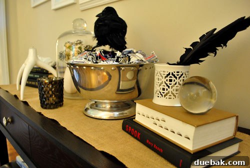 A bowl of Halloween candy, including Three Musketeers and York Peppermint Patties.
