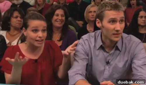 Woman gesturing emphatically on stage