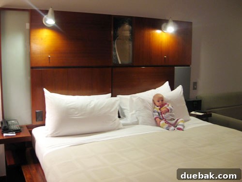 Baby Clara in a hotel bed at Flatotel