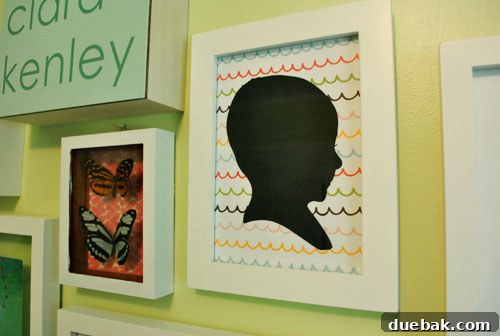 Close-up of the traditional curved shoulder cut on the baby silhouette