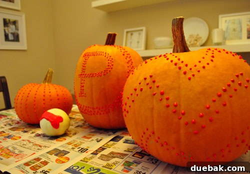 Create Whimsical Puffy Paint Pumpkins 11 Four pumpkins with unique puffy paint designs